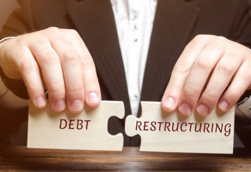 Les différences entre le rachat de crédit et la restructuration de dettes